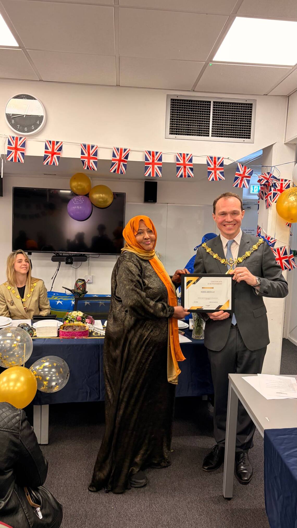 Mayor Tom Bennett Handing out certificates