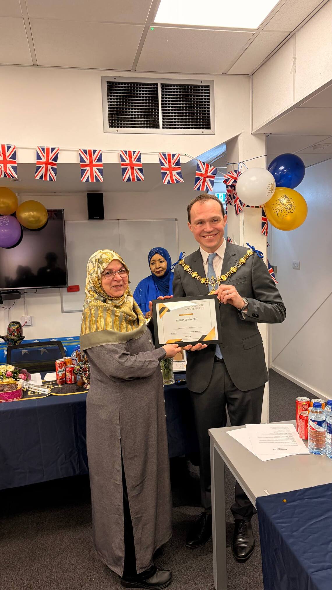 RBKC Mayor handing certificate
