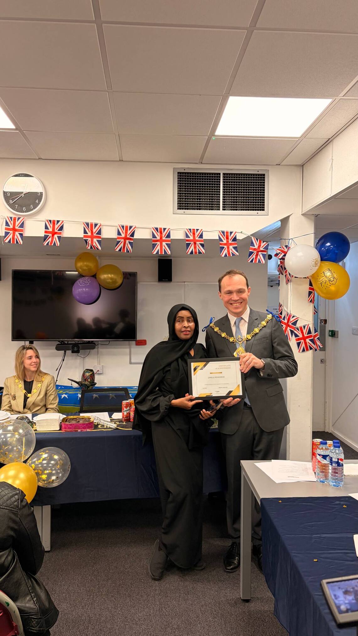 The Mayor Handing certificates